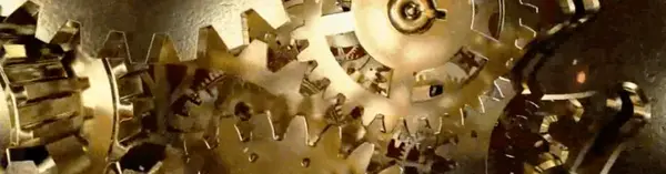 A close up cropped imaged showing different gears layered on top of each other.