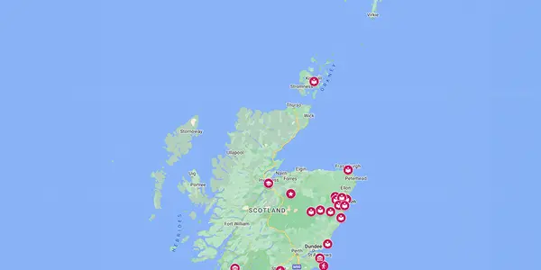 A map of Scotland with pink markers to indicate event locations.